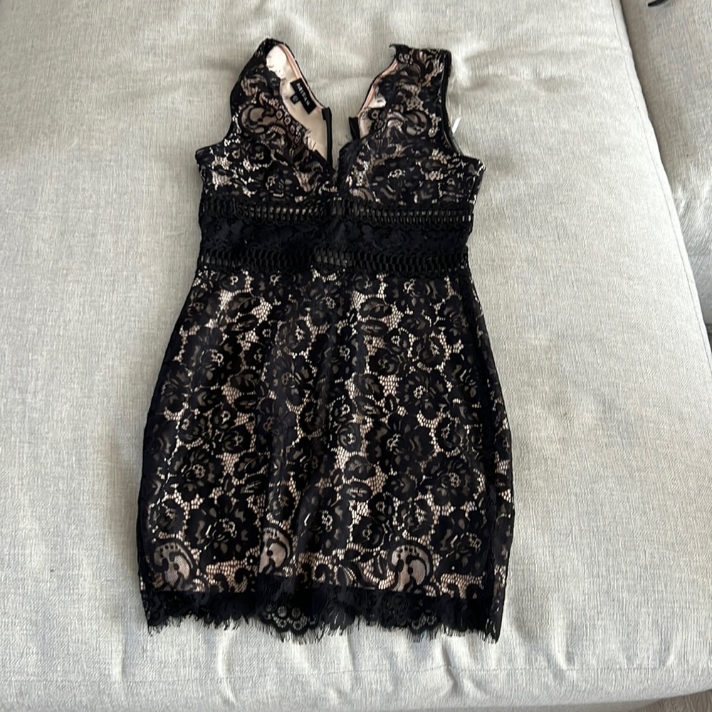 Size 6 black lace nude slip dress. Worn once.